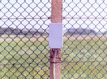 Stealth-Flex detects attempts to climb, cut or otherwise damage the fence. Cutting the cable itself will generate a tamper or intruder alarm. fence perimeter protection detection security system 