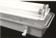 Vaportite Fluorescent housing impact resistant institutional lighting lights fixtures Vaportite Fluorescent offers one or two lamp T-5 OR T-8, IP65 and/or IP67. This vaportite's features include an impact resistant lens, continuous-poured "memory seal" gasketing, reinforced FRP housing, a rigid universal gear tray and strong non-metallic clips. 