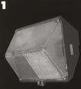 Compact Wallpack 42 Watt Fluorescent Plastic Lens  LIGHT FIXTURE Compact wallpacks have a die-cast housing with powdercoat finished and a porcelain medium base socket assembly.  One piece semi-specular asymetric anodized aluminum reflector.  UL Listed for wet location use